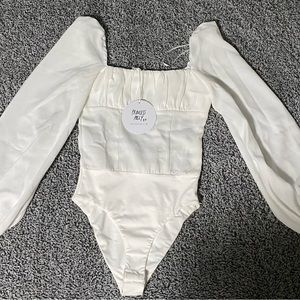 laura bodysuit